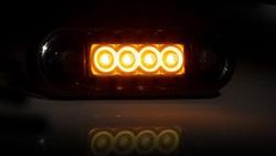 Gelbe LED-Seitenmarkierungsleuchte mit runder, flacher, schwarzer Gummiauflage